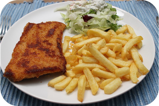 Schnitzel met champignon- of peperroomsaus